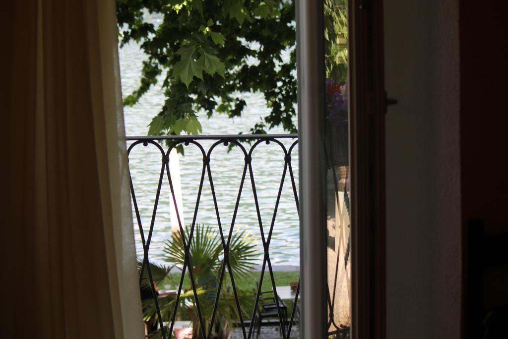 Osteria Battello Hotell Caslano Eksteriør bilde